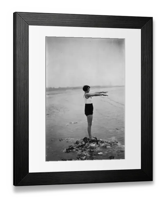 Framed Print : Low Dive. 25th March 1929: A swimmer prepares for a plunge into the sea at Margate, Kent Framed Print : Low Dive. 25th March 1929: A swimmer prepares for a plunge into the sea at Margate, Kent
