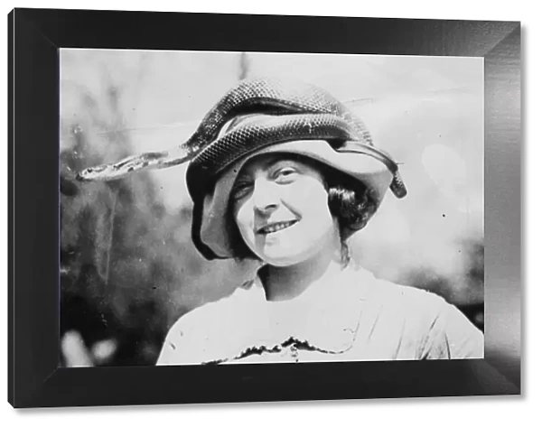 Snake Hat. circa 1930: Miss Evine Doty, of the Reptile Study Society