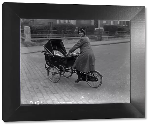 Cyclepram. 1926: A mother gets all the exercise she needs pushing her pram