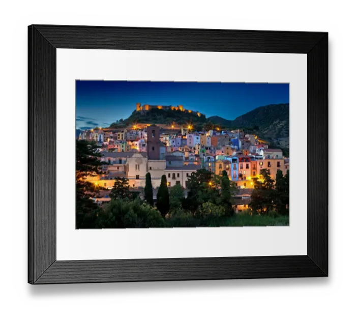 Framed Print : Nighttime view over the colourful town of Bosa and its medieval castle along the Temo Framed Print : Nighttime view over the colourful town of Bosa and its medieval castle along the Temo