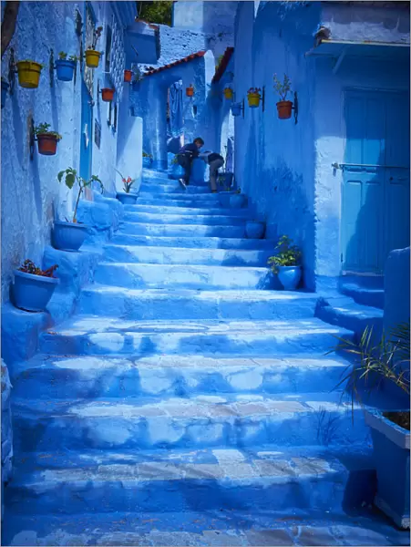 Steps of colorful blue historical village