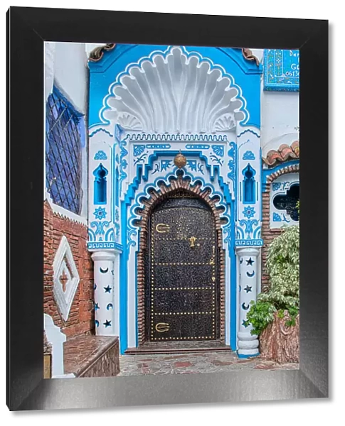 An ornate blue and white doorway in the Blue City of Chefchaouen