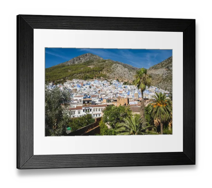 Framed Print : Panoramic aerial view of Chefchaouen city skyline in front of the Rif mountains, Morocco Framed Print : Panoramic aerial view of Chefchaouen city skyline in front of the Rif mountains, Morocco
