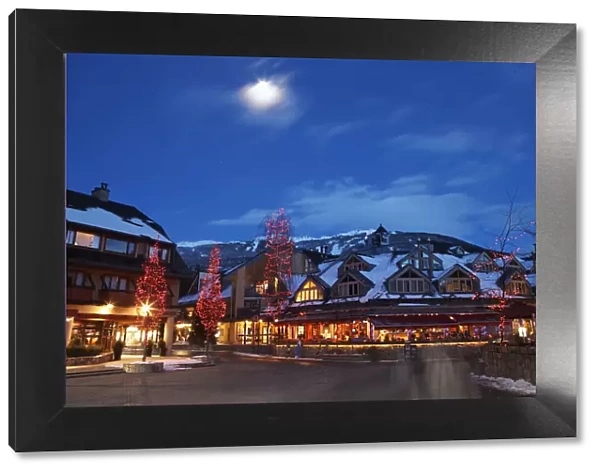 Canada, British Columbia, moon over Whistler Village at dusk