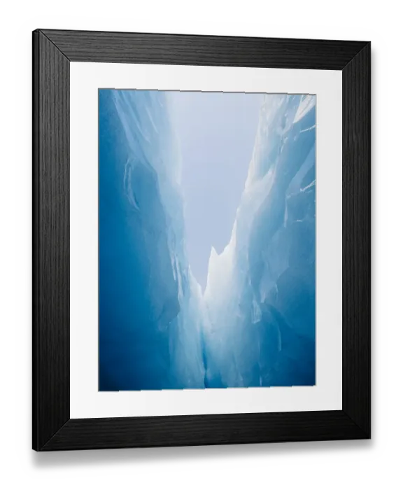 Framed Print : Looking up at the blue sky from deep with in a glaciers jagged crevasse Framed Print : Looking up at the blue sky from deep with in a glaciers jagged crevasse