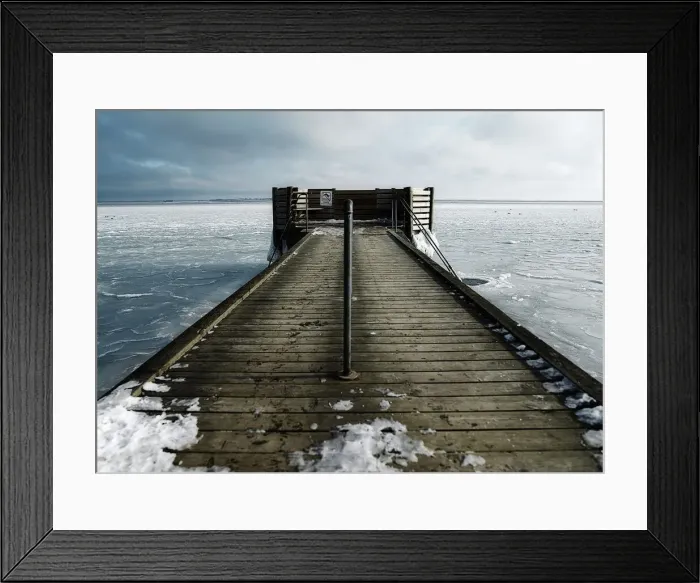 Framed Print : Hole in the ice for winter bathing by a jetty Framed Print : Hole in the ice for winter bathing by a jetty