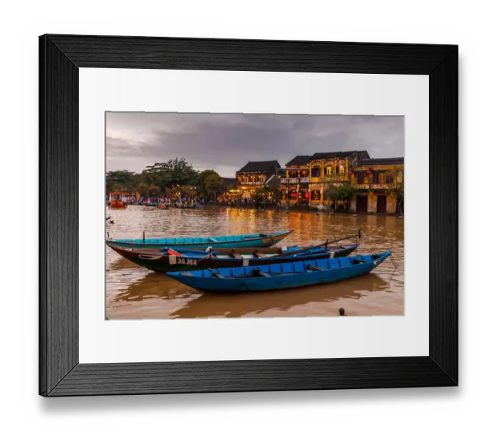 Framed Print : Traditional boats in front of ancient architecture in Hoi An, Vietnam Framed Print : Traditional boats in front of ancient architecture in Hoi An, Vietnam