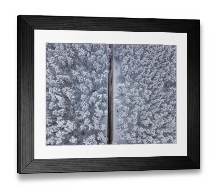 Framed Print : Aerial drone view of road in idyllic winter landscape