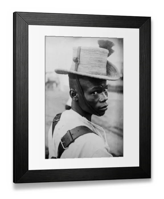 Framed Print : An Askari. 1930: An Askari soldier in Kenya wearing their tall-crowned Framed Print : An Askari. 1930: An Askari soldier in Kenya wearing their tall-crowned