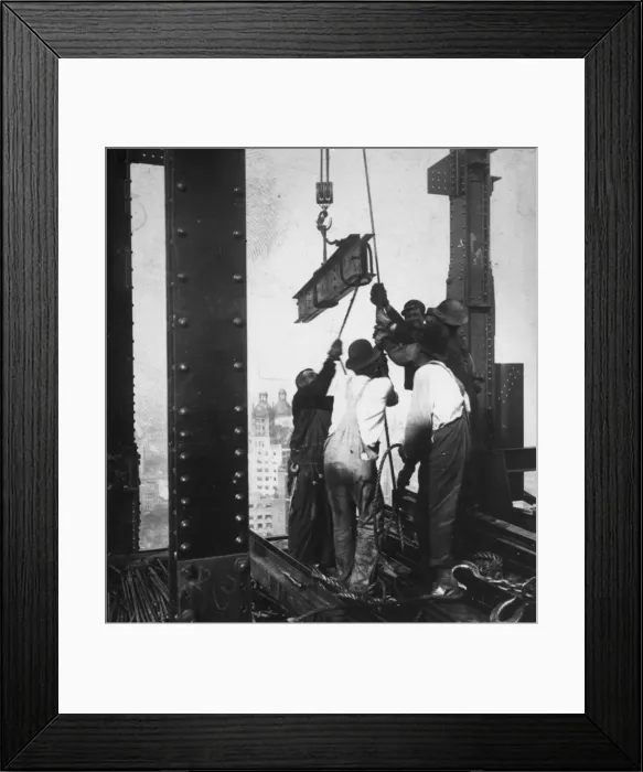 Framed Print : Manpower. circa 1930: A group of men hauling a girder up into a skyscraper Framed Print : Manpower. circa 1930: A group of men hauling a girder up into a skyscraper