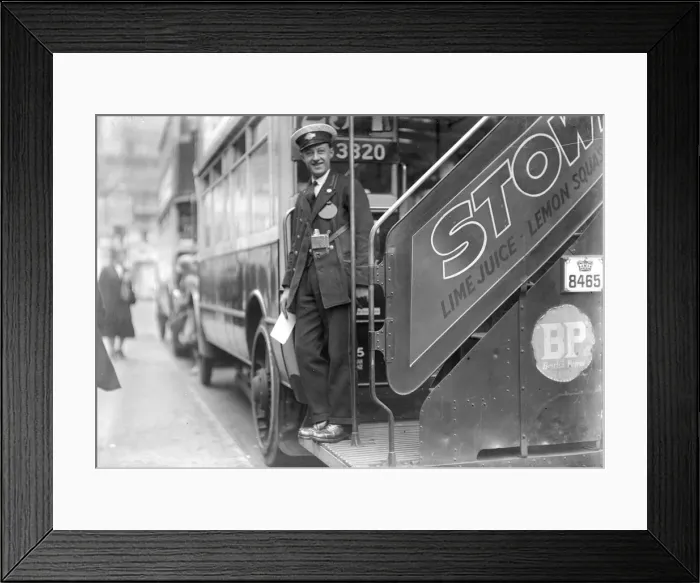 Framed Print : Bus Conductor Framed Print : Bus Conductor