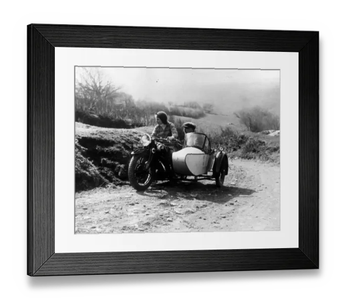 Framed Print : Sidecar. circa 1930: A couple take a ride in the countryside with their motorcycle Framed Print : Sidecar. circa 1930: A couple take a ride in the countryside with their motorcycle