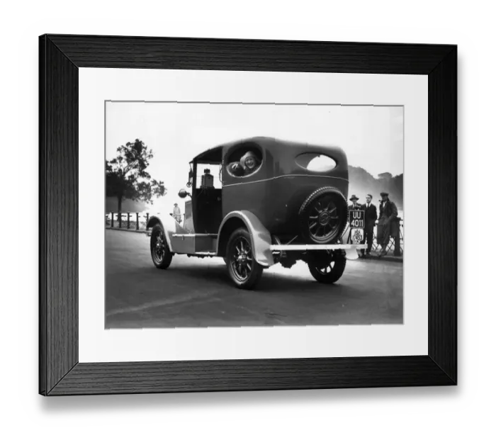 Framed Print : Cab Ride. circa 1930: A passenger enjoys her ride in a Cape cab Framed Print : Cab Ride. circa 1930: A passenger enjoys her ride in a Cape cab
