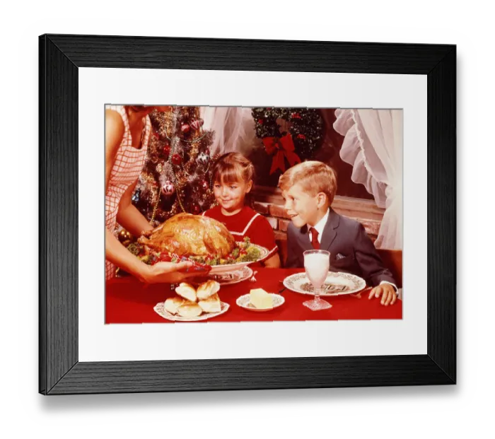 Framed Print : Mother showing roast turkey to children (7-10) at Christmas meal Framed Print : Mother showing roast turkey to children (7-10) at Christmas meal