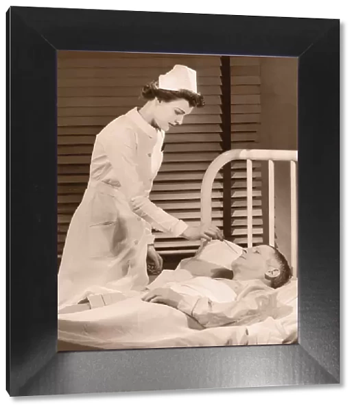 Nurse taking male patients temperature (B&W sepia tone)