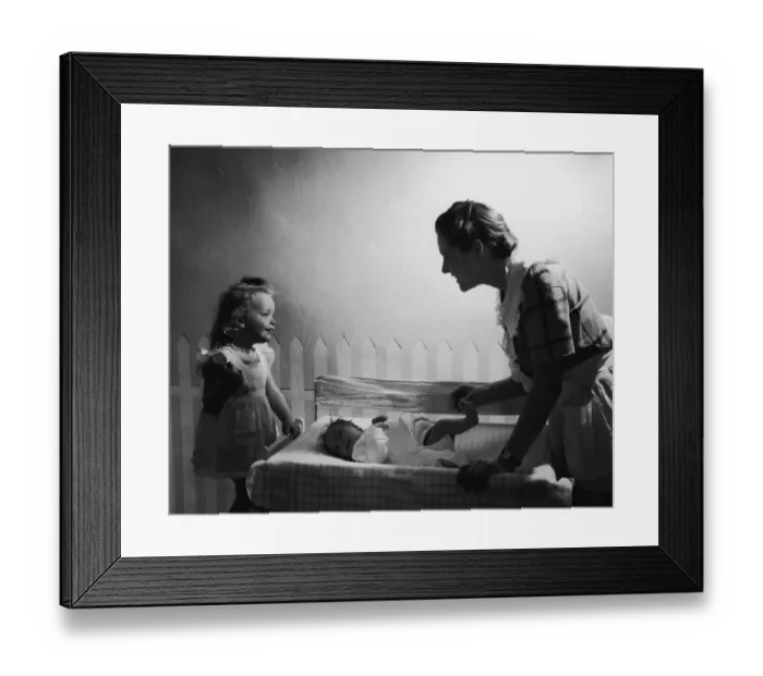 Framed Print : Mother with baby and daughter (6 months to 6 years) smiling (B&W)