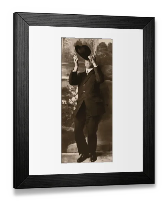 Framed Print : Man catching hat (B&W sepia tone) Framed Print : Man catching hat (B&W sepia tone)