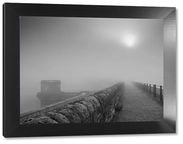 Sun in the mist at Ladybower dam
