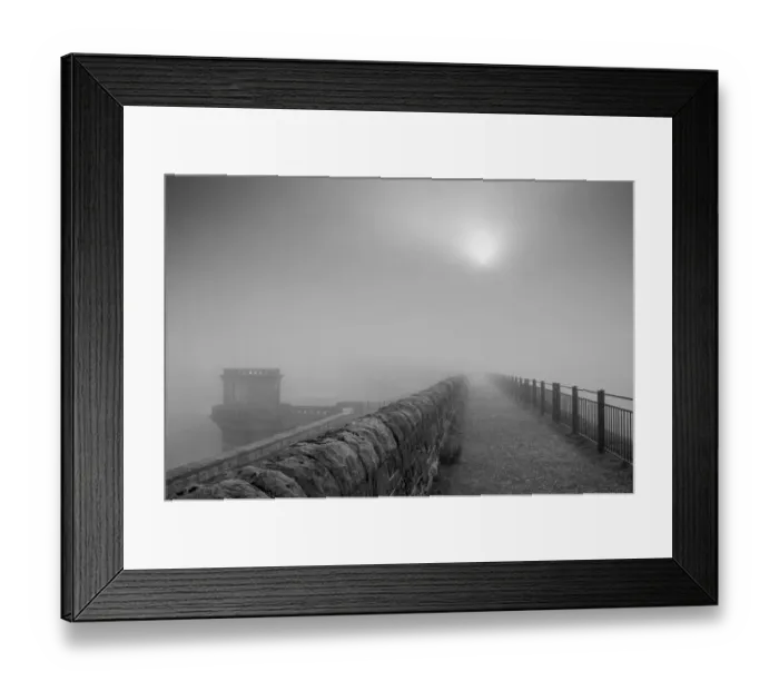 Framed Print : Sun in the mist at Ladybower dam