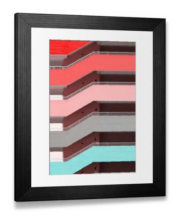 Framed Print : A bright and colourful facade of a high rise building Framed Print : A bright and colourful facade of a high rise building