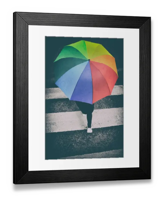 Framed Print : Person crossing a pedestrian crossing with a rainbow umbrella Framed Print : Person crossing a pedestrian crossing with a rainbow umbrella