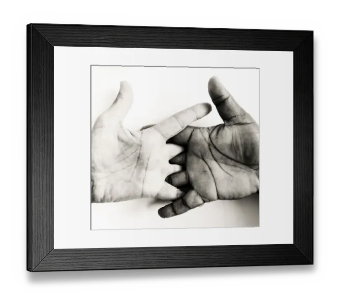 Framed Print : Two hands, of different skin colors, symbolizing brotherhood Framed Print : Two hands, of different skin colors, symbolizing brotherhood