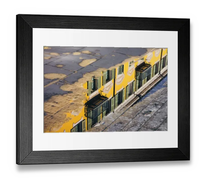 Framed Print : Reflection of a yellow building in a puddle, Nice, France Framed Print : Reflection of a yellow building in a puddle, Nice, France