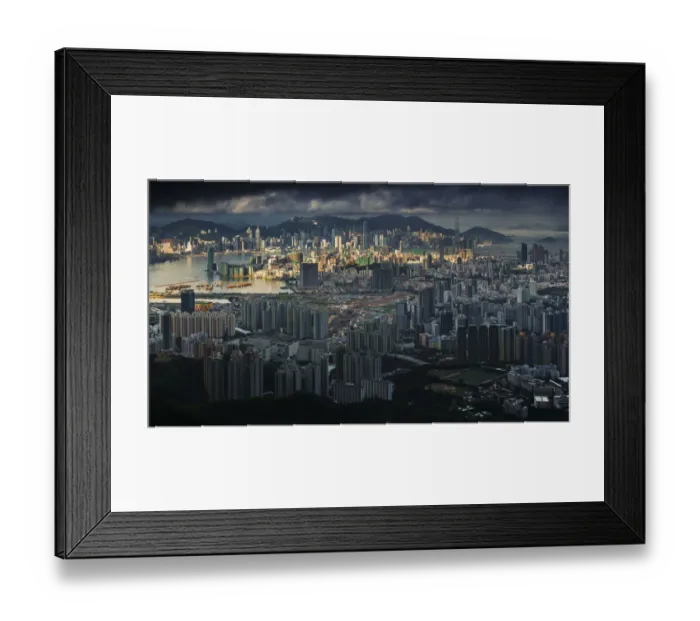 Framed Print : Sunshine over cloudy Hong Kong City Framed Print : Sunshine over cloudy Hong Kong City
