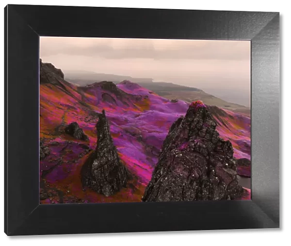 Fantasy aerial picture above the dramatic landscape with infrared colors in Scotland