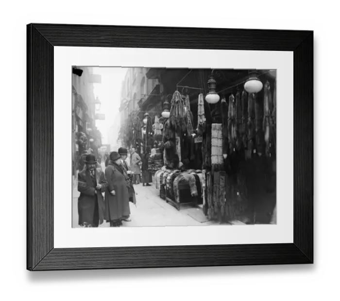 Framed Print : Fur Store. April 1929: Fur coats and accessories hang outside a fur stall Framed Print : Fur Store. April 1929: Fur coats and accessories hang outside a fur stall