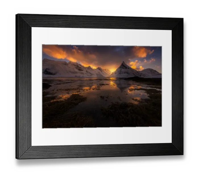 Framed Print : Sunrise over lofoten snow mountain peaks