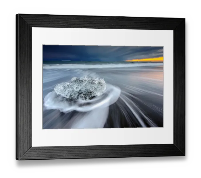 Framed Print : Iceberg on a beach