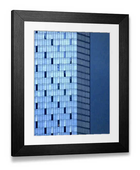 Framed Print : A modern corporate building set against a blue sky at dusk Framed Print : A modern corporate building set against a blue sky at dusk