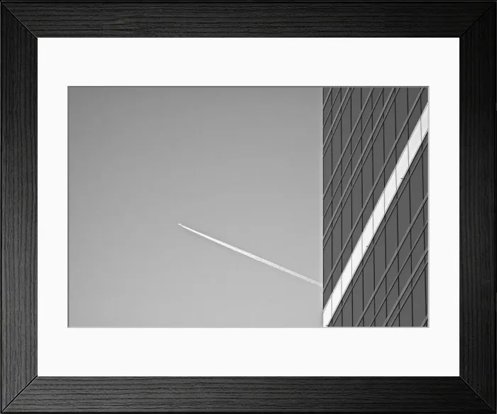 Framed Print : Black and White Skyscraper With Vapor Trail Framed Print : Black and White Skyscraper With Vapor Trail