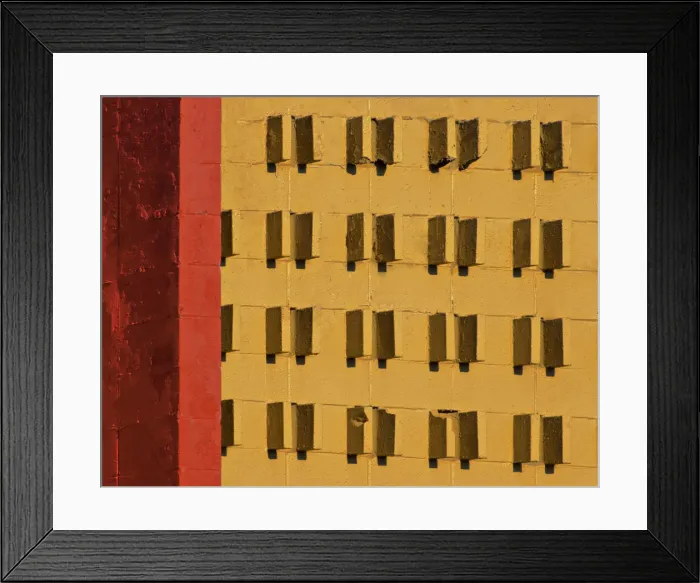 Framed Print : Yellow Studded Wall Framed Print : Yellow Studded Wall