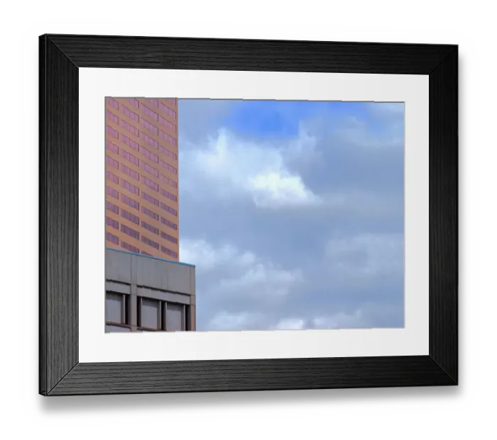 Framed Print : Clouds and a City