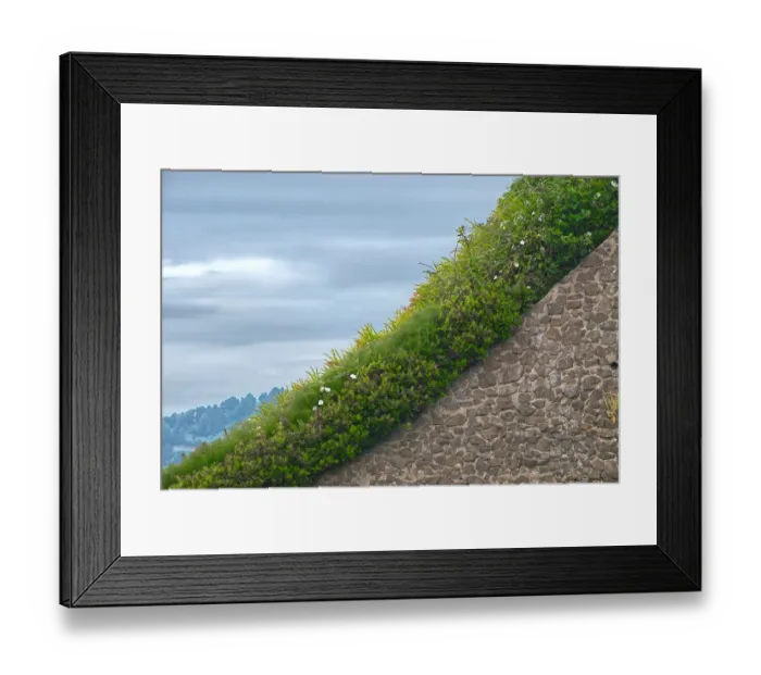 Framed Print : Sea Wall. A color photograph of the stone wall to the entrance to the beach at Newport Framed Print : Sea Wall. A color photograph of the stone wall to the entrance to the beach at Newport