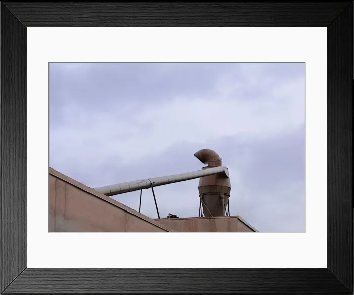Framed Print : Hopper. A color photo of an industrial ventilation turbine on the roof Framed Print : Hopper. A color photo of an industrial ventilation turbine on the roof