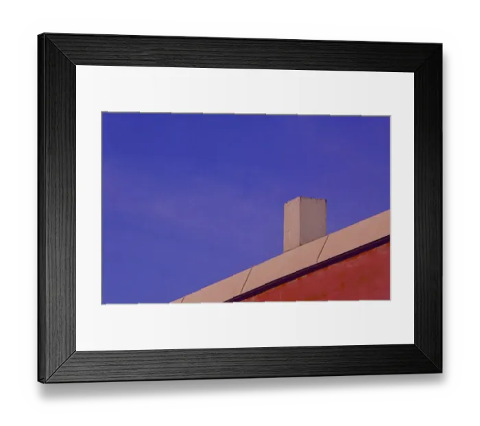 Framed Print : Red Wall. A color photo of a red commercial building in southeast Portland