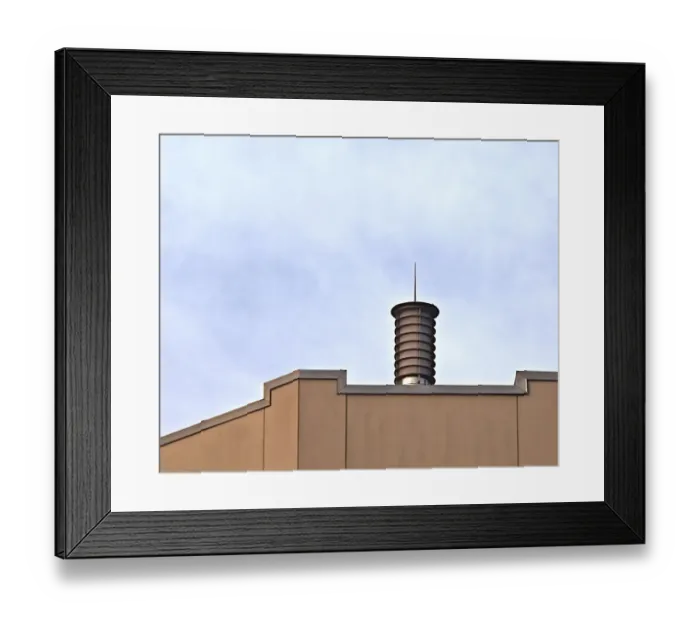Framed Print : Skylight. A color photo of a rooftop light on a commercial building in