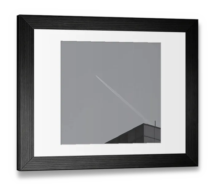 Framed Print : Jet Over Building Framed Print : Jet Over Building