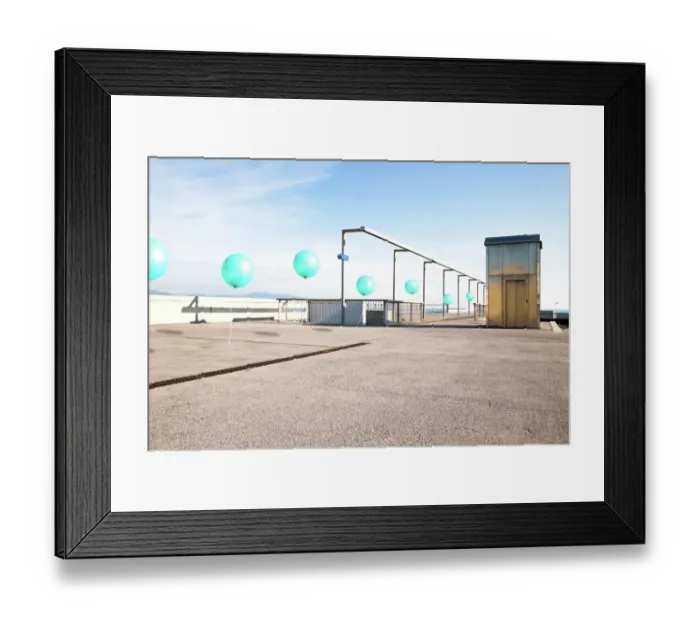 Framed Print : Poetic picture of stop motion pictures in one of a line of green balloons flying in city corner with nice perspective Framed Print : Poetic picture of stop motion pictures in one of a line of green balloons flying in city corner with nice perspective