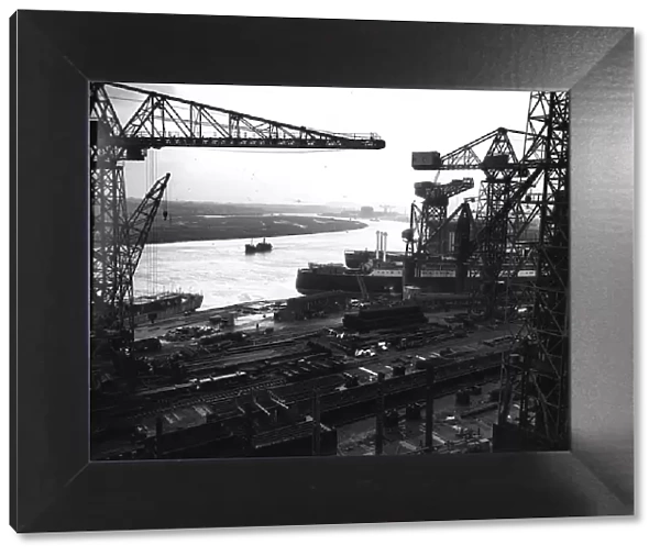Shipyards. 23rd January 1951: A view of John Brown's shipyards on the River Clyde
