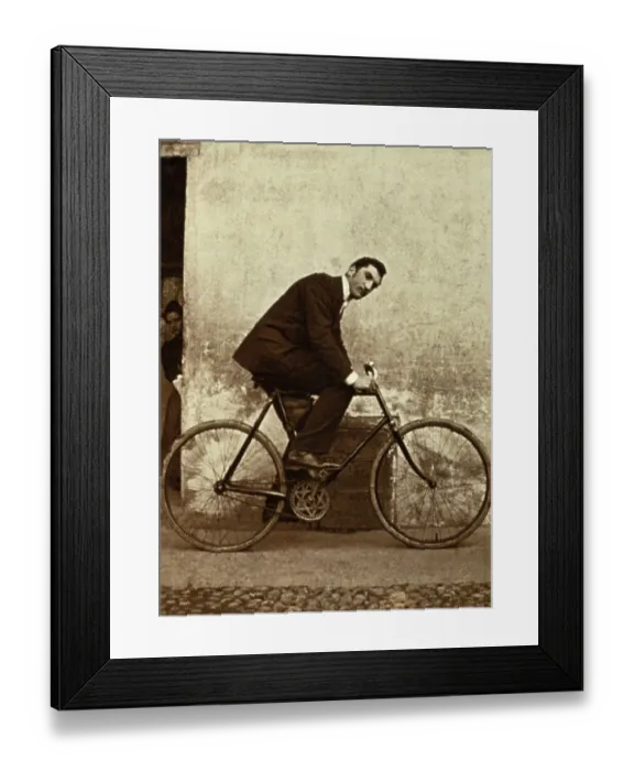 Framed Print : Man on Antique Bicycle Framed Print : Man on Antique Bicycle