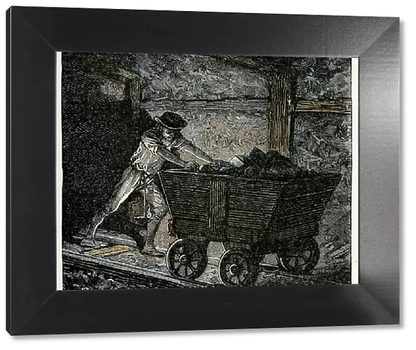 Victorian coal miner pushing a minecart
