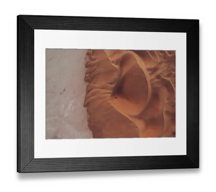 Framed Print : Drone image looking down on the edge of a desert dune at sunset, Abu Dhabi, United Arab Emirates Framed Print : Drone image looking down on the edge of a desert dune at sunset, Abu Dhabi, United Arab Emirates