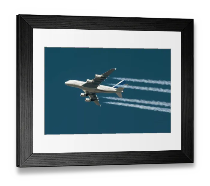 Framed Print : Inflight view of an Airbus A380-841 wide body airliner with contrails Framed Print : Inflight view of an Airbus A380-841 wide body airliner with contrails