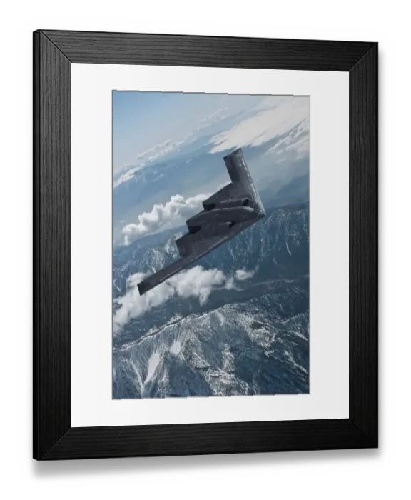 Framed Print : Inflight view of a USAF Northrop Grumman B-2A Spirit stealth bomber over mountains Framed Print : Inflight view of a USAF Northrop Grumman B-2A Spirit stealth bomber over mountains
