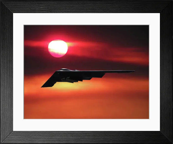 Framed Print : Inflight view of a USAF Northrop Grumman B-2A stealth bomber in a sunset Framed Print : Inflight view of a USAF Northrop Grumman B-2A stealth bomber in a sunset