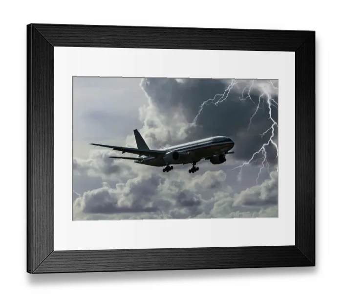 Framed Print : A Boeing 777 wide body airliner landing at Miami International Airport during a lightning storm Framed Print : A Boeing 777 wide body airliner landing at Miami International Airport during a lightning storm